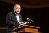 Todd Brady, special assistant to the president for university relations, reads scripture during Family Weekend chapel. - Photo by Jacob Moore