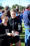 10/274/11 - Cross country runners Cally Howell and Allison Martin help out at a high school meet on 91������'s campus.