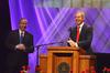 Tony Blair, former British prime minister, laughs while answering a question asked by David Dockery, president of the university, during the 2011 Scholarship Banquet. - Photo by Jacob Moore