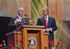 David S. Dockery, president of the university, asks Tony Blair, former British Prime Minister, several questions at the Scholarship Banquet. - Photo by Morris Abernathy