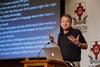 Jeffrey Hardin, professor and chair of the department of zoology at University of Wisconsin-Madison, speaks on "Glory in Fascination" to members of the Pew Research program. - Photo by Jacob Moore