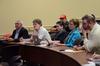Guests listen as Melody Harper speaks during the "Culture and Crisis" Town and Gown lecture series.  - Photo by Anne Richoux