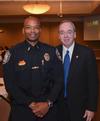 Lieutenant Tyreece Miller of the Jackson Police Dept. and David S. Dockery, president of Union University, share a moment at the fourth annual Remember Me Walk. - Photo by Morris Abernathy