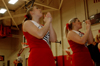 02/19/04 - Senior captain Aleica Robertson (front) leads the cheerleaders during a Union ballgame.
