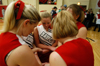02/19/04 - The Union cheerleaders take a moment to pray prior to a Union game.