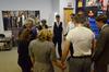 David Burke, professor of theatre and director of the theatre, prays with the Union Players prior to their performance of "The Importance of Being Earnest" on opening night.  - Photo by Anne Richoux