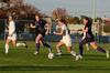 10/28/11 - Ashlie Watson fights for possession against Trevecca Nazarene University opponents on Senior Night. 