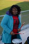 Treasure Hightower, senior digital media studies major, plays with the drum line at the Lady Bulldog soccer game against Trevecca Nazarene University.  - Photo by Anne Richoux