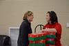 Andi Schreiber (left), senior family studies major, talks with Ashley Jackson, resident director, after packing boxes for Operation Christmas Child on Campus and Community Day.  - Photo by Anne Richoux