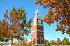 Miller Tower stands tall surrounded by gorgeous Fall trees.  - Photo by Ebbie Davis