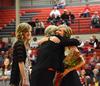 Lanese Dockery, first lady of the university, congratulates Andi Schreiber, senior family studies major, on winning homecoming queen for 2011. - Photo by Zac Calvert