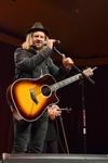 Jon Foreman, musician and lead vocalist of Switchfoot, talks to the crowd during the Homecoming Concert in the G.M. Savage Memorial Chapel. - Photo by Jacob Moore