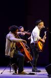 Cellist Keith Tutt, violinist Ann Marie Calhoun and Jon Foreman, musician and lead vocalist of Switchfoot, perform during the Homecoming Concert. - Photo by Jacob Moore