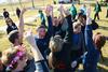Students cheer after winning a relay race during Homecoming Olympics. - Photo by Jacob Moore