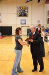 David S. Dockery, president of the university, presents the Champions for Change award to Natalie Schlar, junior social work major and president of Union's International Justice Mission chapter. - Photo by Zac Calvert