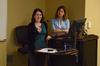 Jennifer Escue and Louisa Saratora, who serve with Catholic Charities of Tennessee, give a lecture titled, "Beyond Good Intentions: When Culture, Crisis, and Social Services Intersect" at a Town and Gown lecture.  - Photo by Anne Richoux