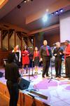 Derique Cannon, junior electrical engineering major, leads MOSAIC choir as they perform in chapel. - Photo by Zac Calvert