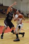 11/15/11 - Anthony Freeman drives to the basket during a game against Cambellsville University.