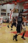 11/15/11 - Dani Marti goes up for a shot during a Bulldog basketball game against Cambellsville University.