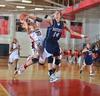 Union's Amy Philamlee brings the ball deep into the paint  during game two of the Rotary Classic. - Photo by Morris Abernathy