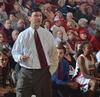 Head Coach Mark Campbell makes adjustments during the game against Westminster College. - Photo by Morris Abernathy