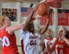 11/323/11 - �鶹��Ƶ's Lavanda Ross comes down with the rebound during the Rotary Classic game with Saint Xavier.
