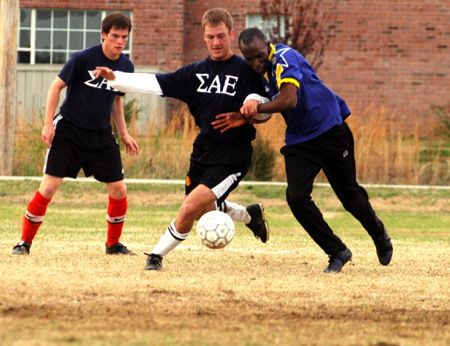 Action from the men's intramural soccer championship between SAE 1 and Onions 1.