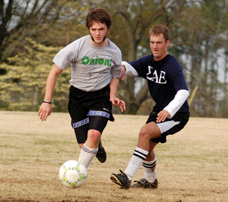 Action from the men's intramural soccer championship between SAE 1 and Onions 1.