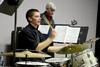 Jason Kriaski, senior philosophy major, plays drums and Bill Nettles, professor of physics and department chair, plays bass during the Fall 2011 Jazz Band Concert. - Photo by Jacob Moore