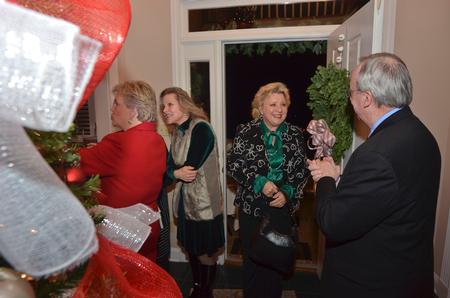 Sheila Mitchell is greeted by David Dockery as she arrives for the Dockery open house.