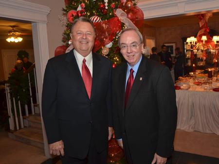 Morris Chapman and David S. Dockery visit with each other at the annual open house on Thursday evening.