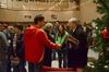 David S. Dockery, president of the university, greets students as they leave McAfee Commons after being read the Christmas story.  - Photo by Ebbie Davis