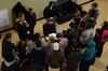 Students take a break from studying during finals week to hear Cameron Ernst, a musician from Dallas, perform in the Bowld Student Commons.  - Photo by Anne Richoux