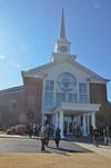 Friends and family leave at the  conclusion of the Commencement Service at West Jackson Baptist Church. - Photo by Morris Abernathy