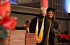 Brittany Marshall, business administration graduate, receives her diploma from David S. Dockery, president of the university, during the Fall Commencement Services held at West Jackson Baptist Church. - Photo by Jacob Moore