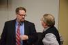 Hunter Baker, associate professor of political science, speaks to Michael Chute, professor of communication arts, at the Town & Gown lecture series. - Photo by Zac Calvert