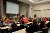 Students vote on a bill during the Student Senate meeting in Harvey Auditorium. - Photo by Anne Richoux