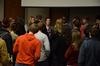 Kylie McDonald, junior political science major, talks with Student Senate members following a senate meeting. - Photo by Anne Richoux