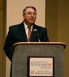 Dr. Michael Chute, SEJC president elect, announces the winners of the Southeastern Journalism Conference competitions. - Photo by Ebbie Davis