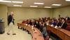 Micah Watson, assistant professor of political science, discusses current issues with Scholars of Excellence participants. - Photo by Jacob Moore