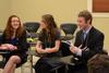 Scholars of Excellence participants play a game of Catchphrase during a break between interviews. - Photo by Jacob Moore