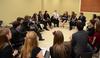 Scholars of Excellence participants play a game of Catchphrase during a break between interviews. - Photo by Jacob Moore
