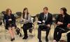 Scholars of Excellence participants play a game of Catchphrase during a break between interviews. - Photo by Jacob Moore