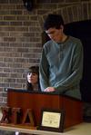 Michael O'Malley, senior English major, presents an original literary work in front of Sigma Tau Delta, a national English honor society, in preparation for the society's national convention in New Orleans. - Photo by Jacob Moore