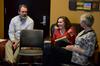 John Netland, Janna Chance, and Pam Sutton give advice to members of Sigma Tau Delta who will be presenting work at the society's national convention in New Orleans. - Photo by Jacob Moore