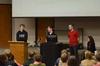 Luke Trammell (middle), sophomore political science major, talks to students about a proposed bill during a student senate meeting. - Photo by Anne Richoux