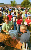 Students removed the stones that made the altar from the September 11 Memorial Environmental Installation. (in foreground: seniors David Caruthers and Josh Duckworth)
 - Photo by Jim Veneman