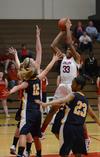 02/28/12 - Adenike Dawodo goes up for a shot during a game against Blue Mountain College.