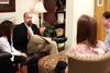 Micah Watson, assistant professor of political science, talks with students in the Warren F. Jones Suite. - Photo by Kristi McMurry