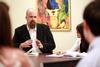 Micah Watson, assistant professor of political science, holds a small discussion with students in the Warren F. Jones Suite. - Photo by Kristi McMurry